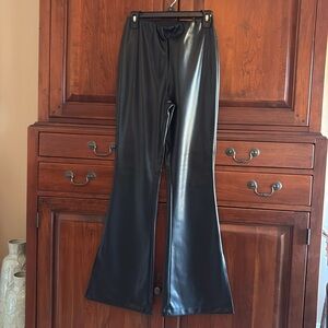 Leather look black pants size 8.